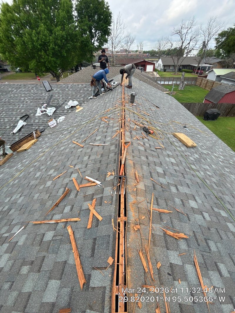 Good Vibes crew doing a ridge repair and tear-off